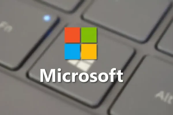 Microsoft logo over laptop keyboard 1000x600.webp.webp