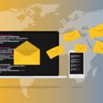 Laptop and phone being bombarded with emails illustraiton 1.jpg